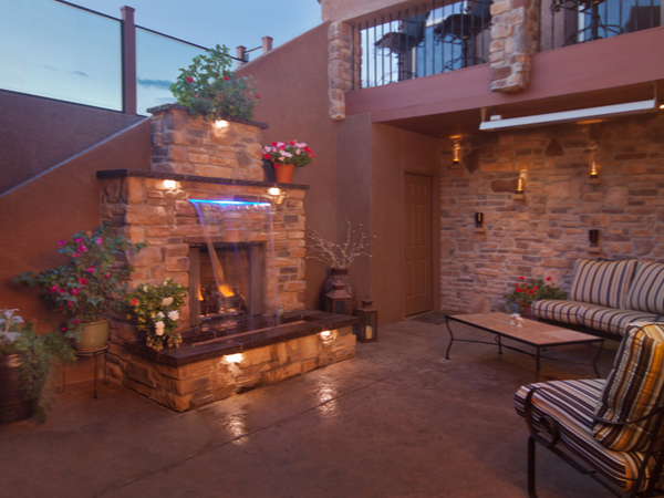 Beautiful Outdoor Living Space With A Custom Water Feature